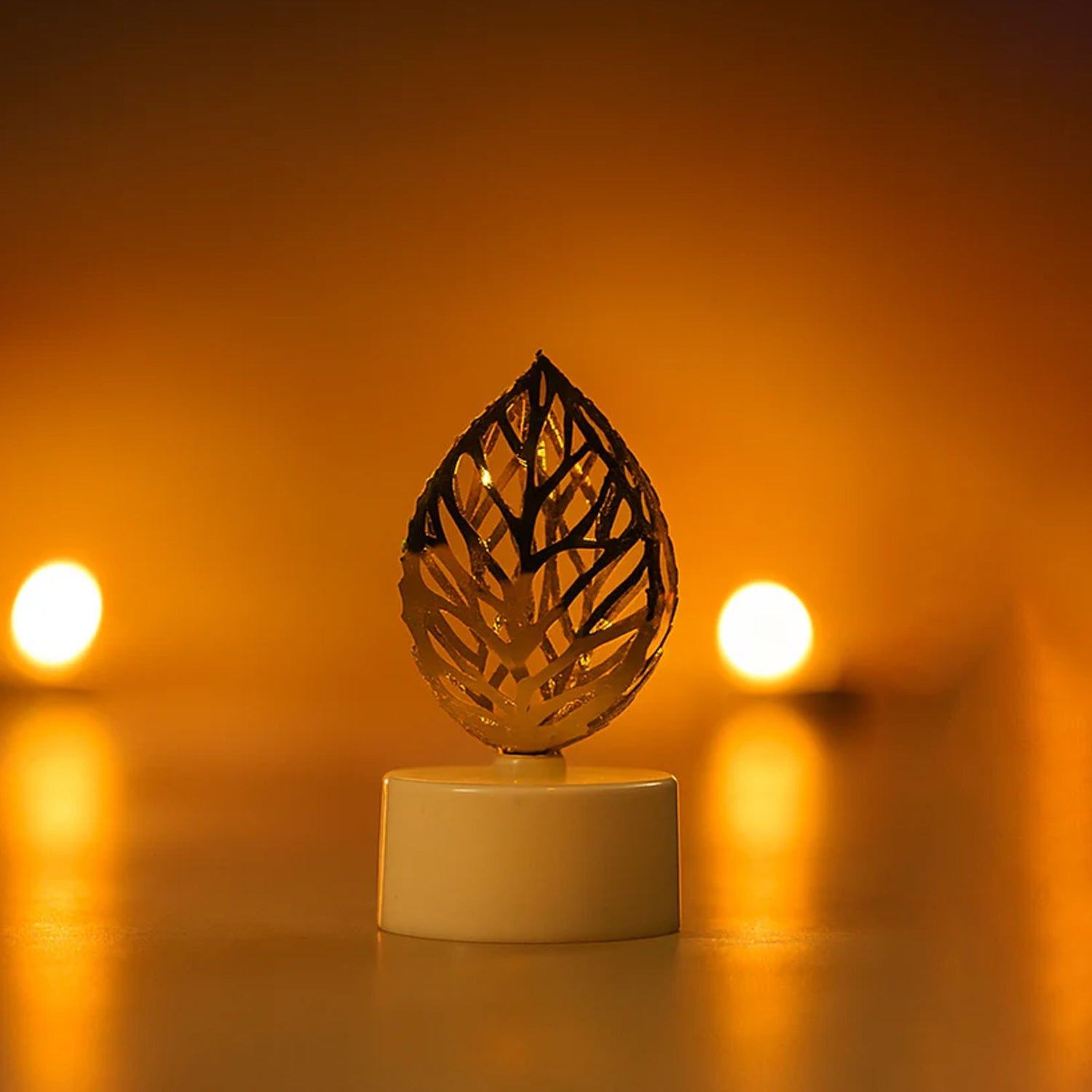 Decorative Golden Leaf Shaped Flameless LED Candles (4 Pc) Decorative Golden Leaf Shaped Flameless LED Candles (4 Pc)